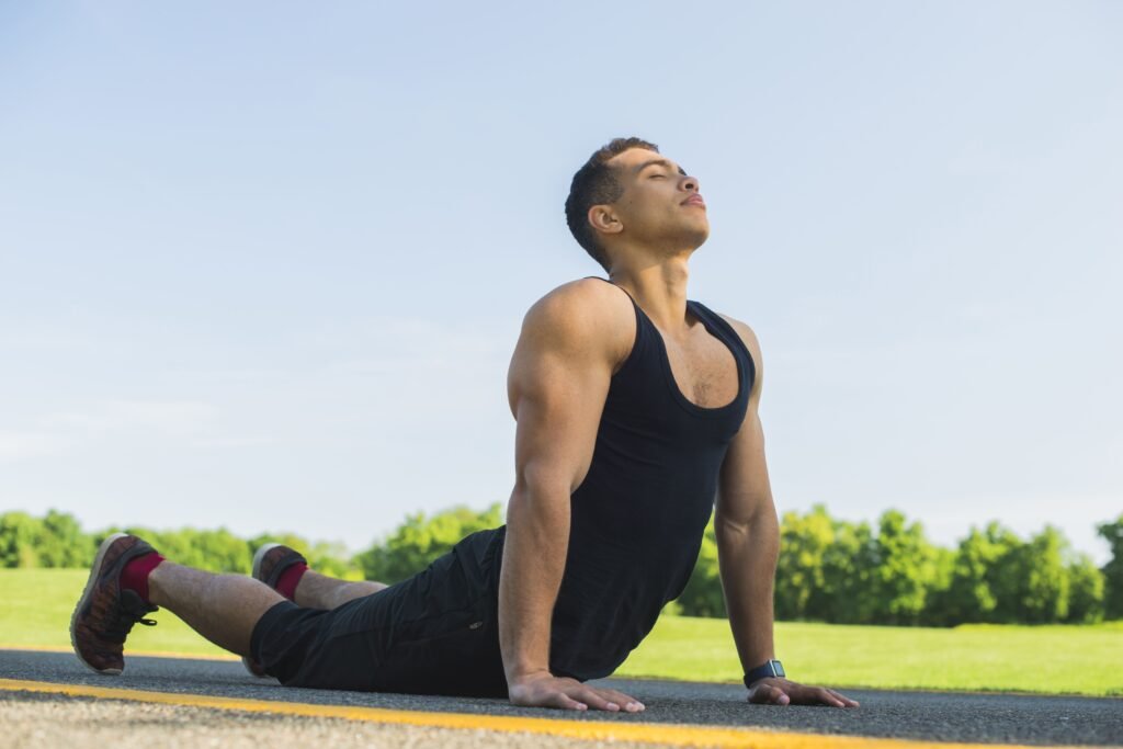 athletic-man-practicing-yoga-outdoor (1)